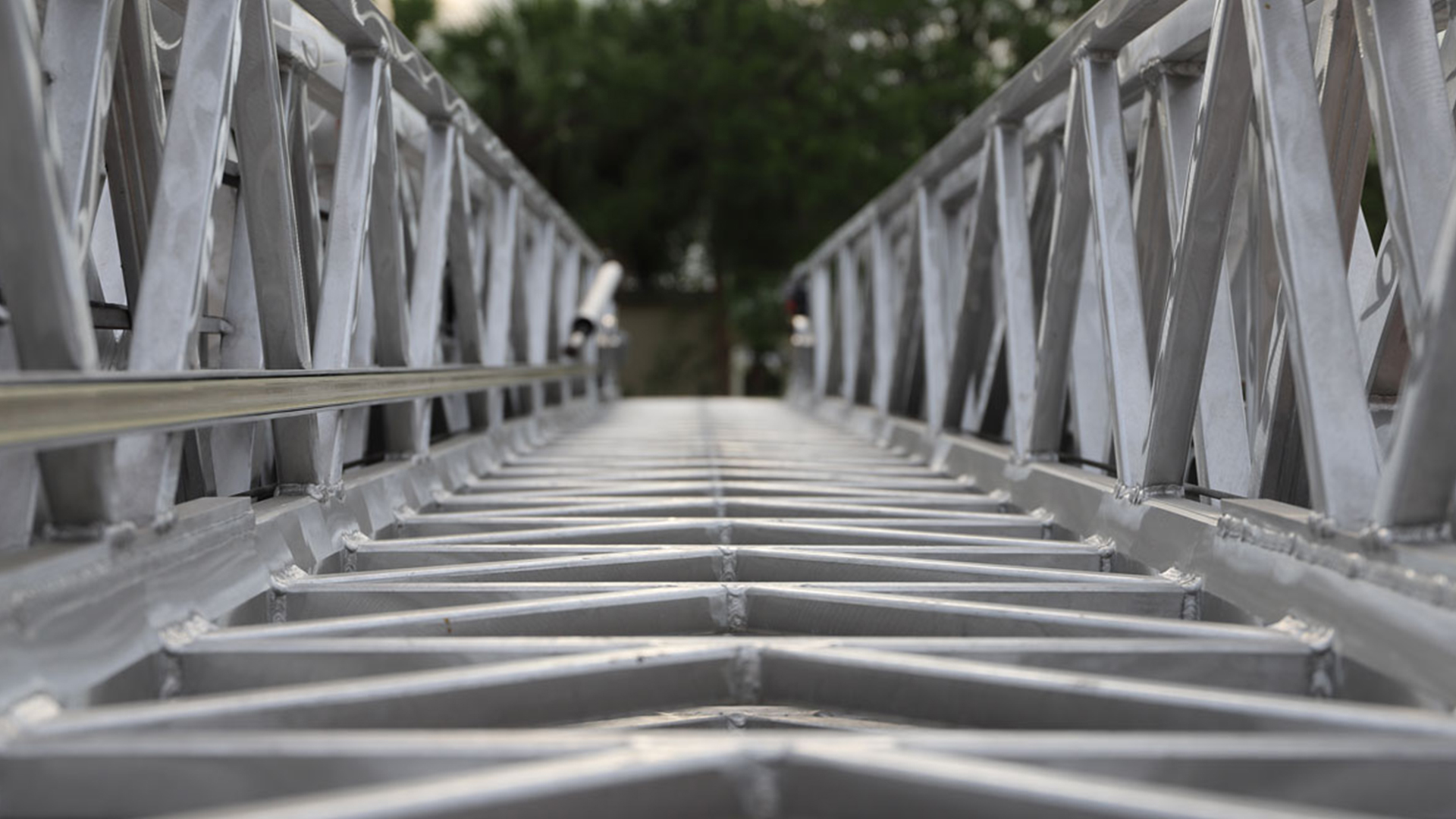 Detailed up-close photo of a fire truck ladder